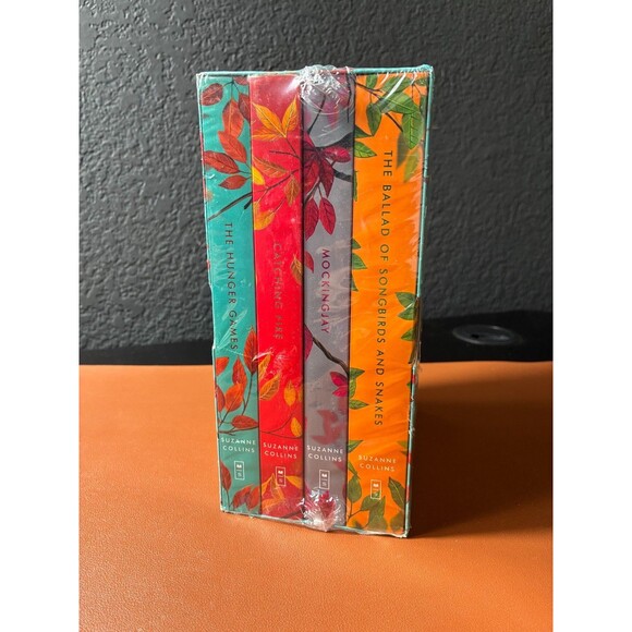 The Deluxe Hunger Games Collection by Suzanne Collins Paper Back  4 Books - Picture 4 of 5